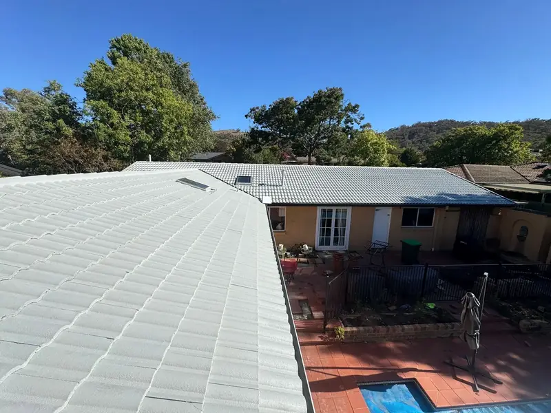 Tiled roof finished in a light grey coating