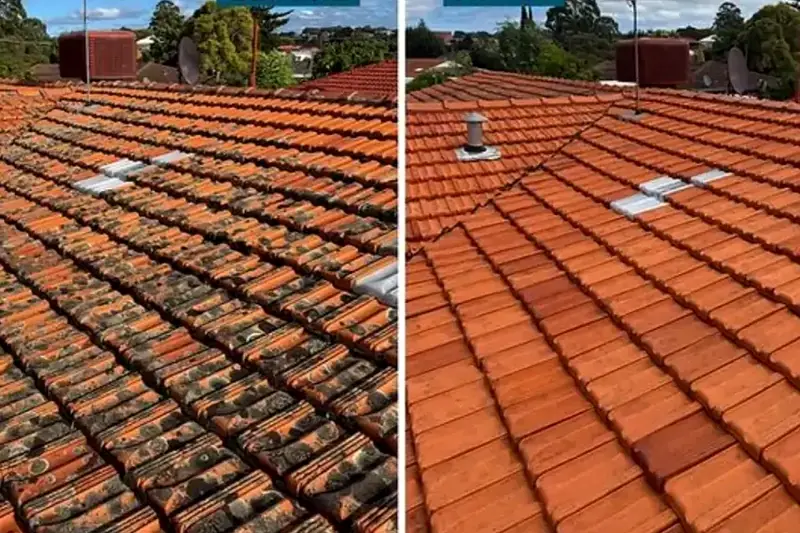 Roof being pressure cleaned
